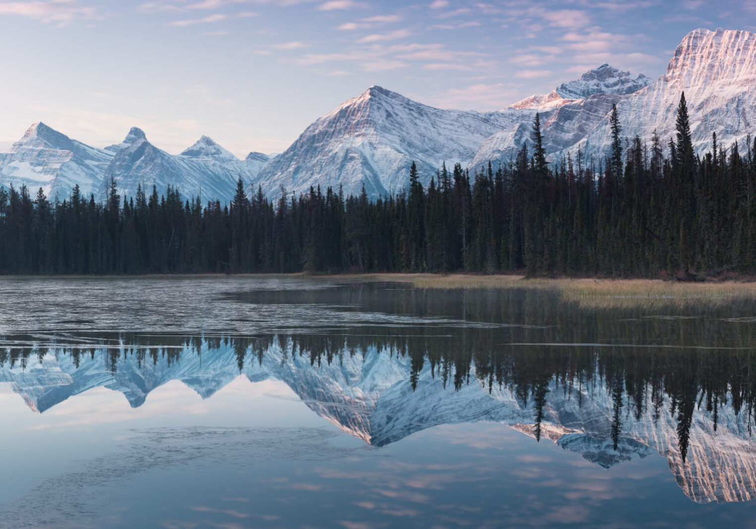 Almost nearly perfect reflection of the Rocky mountains in the B